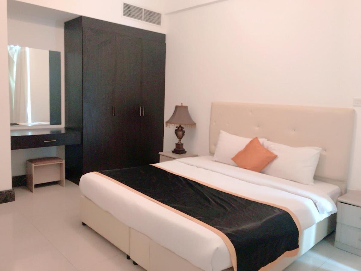 Stout Apartments Manama Room photo
